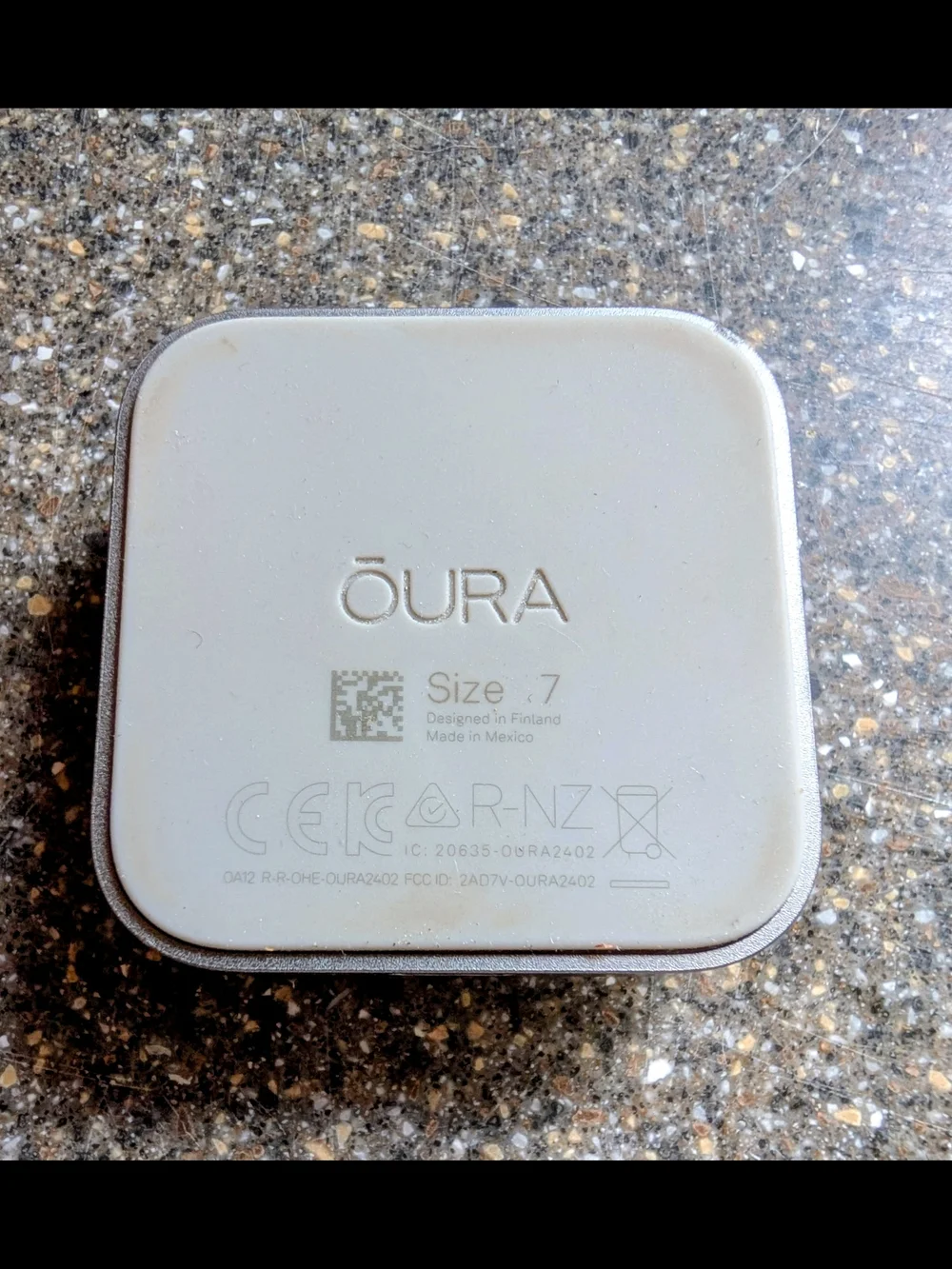 Oura compact charging